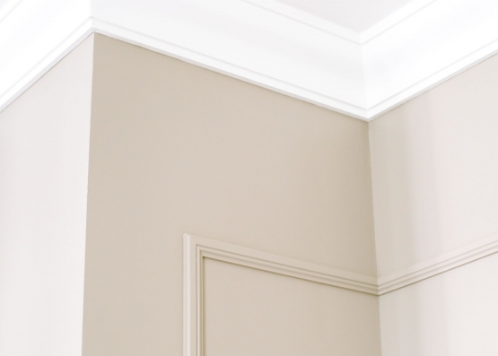 Exterior stucco mouldings that are used to decorate windows and doors